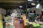 Industrial for sale at Polígono Industrial Sur, San Sebastián de los Reyes, Madrid, 28700 with light fixture, lighting, box, table, building, flooring, engineering, machine, event and chair around