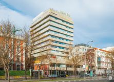 Office for rent at Paseo Castellana, 7, Chamberí, Madrid, 28046 with building, sky, cloud, daytime, plant, skyscraper, tree, tower block, infrastructure and street light around