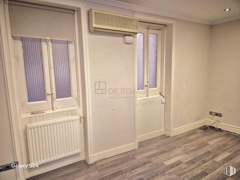 Office for rent at Calle Serrano, Salamanca, Madrid, 28006 with window, flooring, wood, floor, door, apartment, room, wood flooring, molding and wood stain around