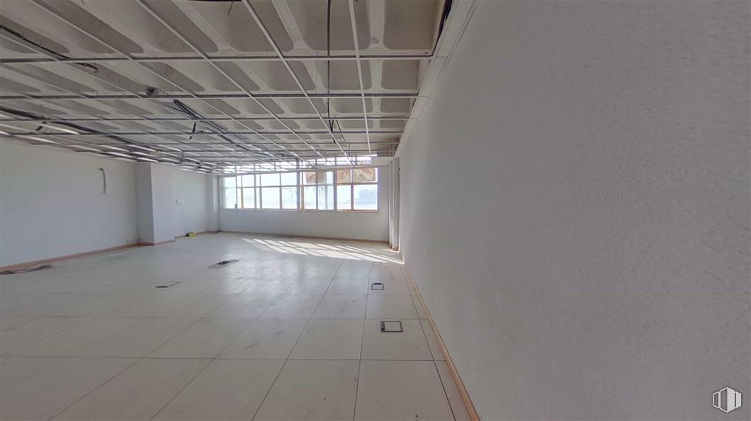 Office for sale at Avenida Democracia, Puente de Vallecas, Madrid, 28031 with window, hall, wood, fixture, flooring, composite material, ceiling, symmetry, glass and space around