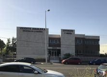 Industrial for sale at Zona industrial, Leganés, Madrid, 28914 with car, building, automotive parking light, sky, tire, land vehicle, wheel, vehicle, motor vehicle and infrastructure around