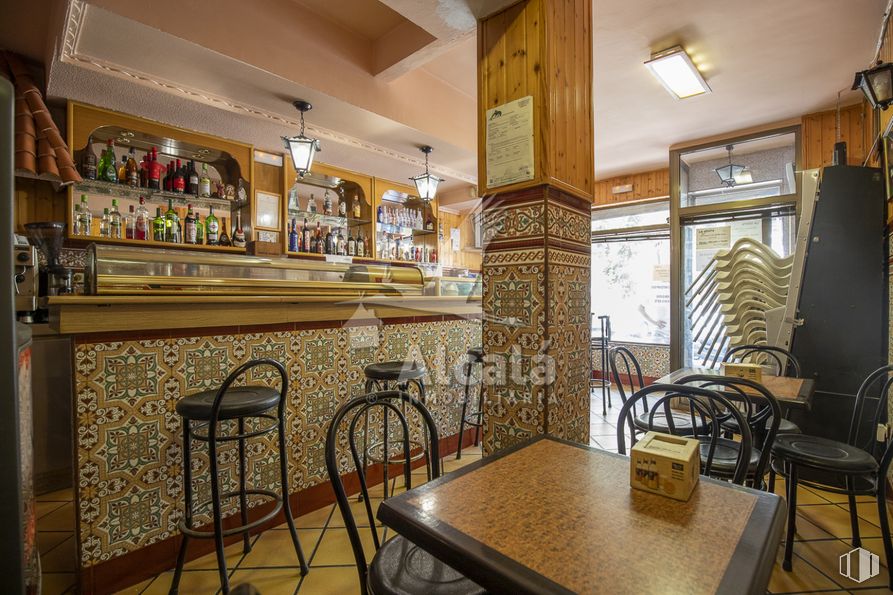 Retail for sale at Zona del Val, Alcalá de Henares, Madrid, 28804 with chair, table top, stool, furniture, table, interior design, drinking establishment, real estate, wood and building around