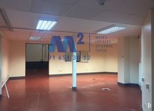 Industrial for rent at Avenida Fuente Nueva, San Sebastián de los Reyes, Madrid, 28700 with light fixture, window, building, flooring, fixture, floor, hall, ceiling, glass and space around