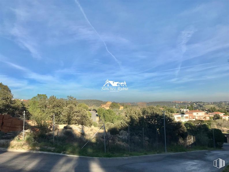 Land for sale at Calle Gerifalte, Las Rozas de Madrid, Madrid, 28230 with cloud, plant, sky, daytime, ecoregion, nature, natural landscape, tree, road surface and asphalt around