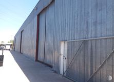 Industrial for rent at Carretera Andalucía, 16, Getafe, Madrid, 28906 with door, sky, building, asphalt, road surface, wood, composite material, tints and shades, facade and shade around