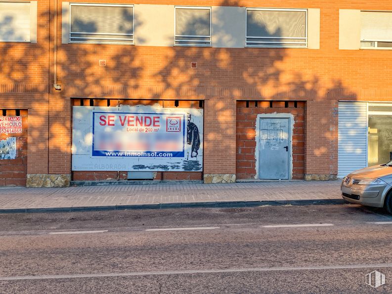 Retail for sale at Calle Malacuera, Torrelaguna, Madrid, 28180 with window, door, car, building, tire, asphalt, road surface, automotive lighting, rectangle and vehicle door around