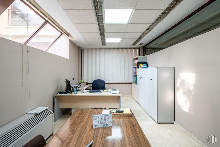 Office for sale at Zona Auditorio, Las Rozas de Madrid, Madrid, 28230 with desk, table top, cupboard, table, cabinetry, furniture, interior design, flooring, ceiling and office equipment around