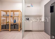 Office for sale & for rent at Calle Serrano, Salamanca, Madrid, 28001 with furniture, cabinetry, cupboard, flooring, floor, interior design, wood, ceiling, lighting and shelving around