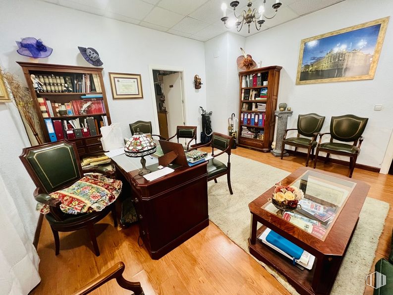 Office for rent at Calle Doctor Esquerdo, Salamanca, Madrid, 28028 with chair, picture frame, bookcase, desk, chandelier, coffee table, furniture, interior design, flooring and table around