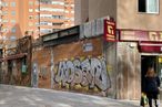 Retail for sale at Calle Venezuela, 1, Coslada, Madrid, 28823 with person, window, building, pants, coat, road surface, paint, art, wall and luggage and bags around