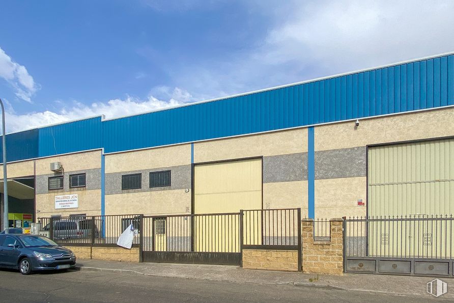 Industrial for sale at Calle Felipe II, 9, Yuncos, Toledo, 45210 with car, building, automotive parking light, sky, cloud, vehicle, asphalt, facade, commercial building and city around