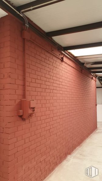 Industrial for sale at Calle Cedro, Arganda del Rey, Madrid, 28500 with light fixture, lighting, wall, red, brick, brickwork, composite material, building material, wood stain and paint around