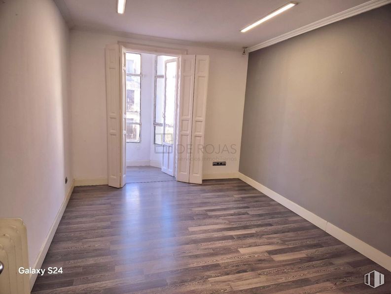 Office for rent at Calle Serrano, Salamanca, Madrid, 28006 with light fixture, lighting, flooring, floor, wood, wood flooring, interior design, apartment, door and ceiling around