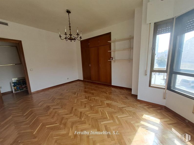 Office for rent at Calle Ferraz, Moncloa - Aravaca, Madrid, 28008 with chandelier, lighting, window, light fixture, fixture, wood, door, flooring, interior design and hall around