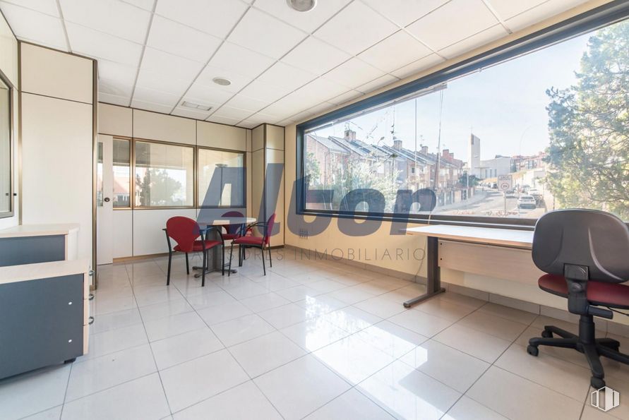 Retail for sale at Calle Rocinante, Fuencarral - El Pardo, Madrid, 28034 with chair, table, window, furniture, property, building, interior design, lighting, office chair and desk around