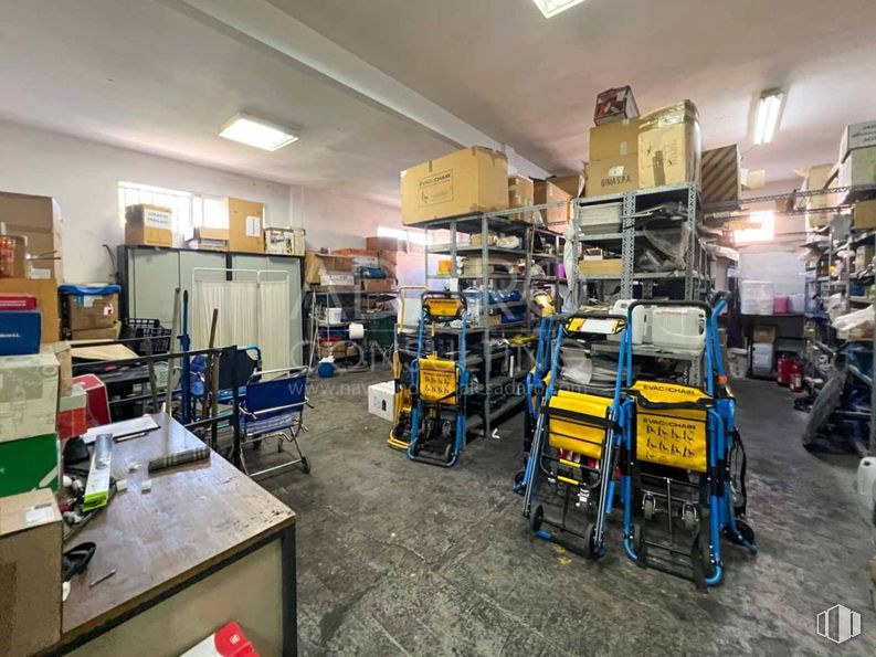 Industrial for sale at Calle Torres Quevedo, Leganés, Madrid, 28914 with shelving, furniture, shelf, technology, machine, engineering, office equipment, chair, retail and factory around