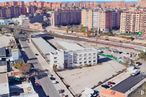 Land for sale at Calle Puerto de Pozazal, 16, Villa de Vallecas, Madrid, 28031 with building, daytime, sky, infrastructure, window, tower block, urban design, condominium, vehicle and house around