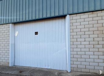 Industrial for sale at Calle León, Magán, Toledo, 45590 with wall, wood, garage door, composite material, siding, concrete, garage, grey, building material and driveway around