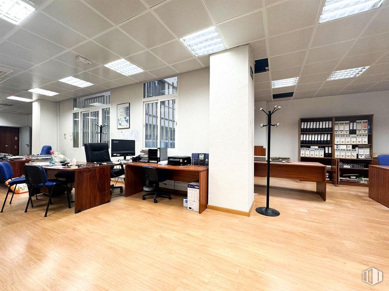 Office for sale at Calle Guzmán el Bueno, Chamberí, Madrid, 28003 with chair, desk, light fixture, lighting, window, furniture, interior design, flooring, ceiling and office chair around