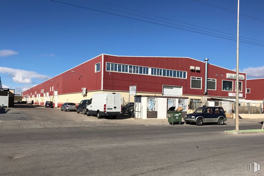 Industrial for sale at Polígono industrial, Cabanillas del Campo, Guadalajara, 19171 with car, van, truck, building, automotive parking light, sky, wheel, property, tire and vehicle around