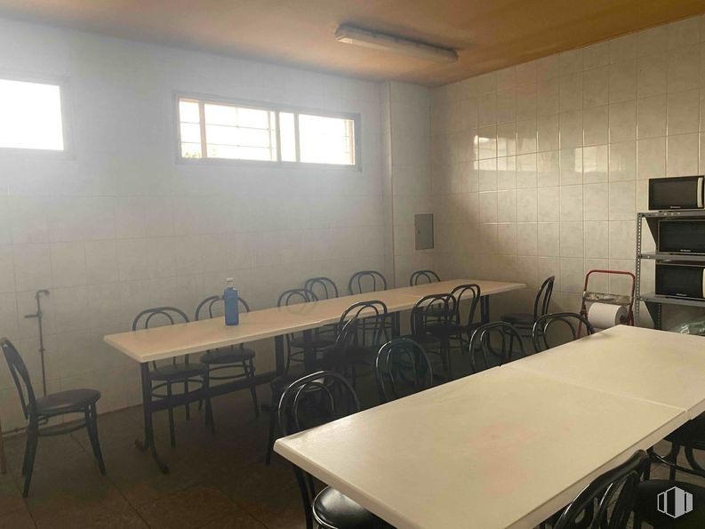 Industrial for sale at Polígono Azque, Alcalá de Henares, Madrid, 28808 with window, chair, light fixture, table top, furniture, table, building, interior design, fixture and flooring around