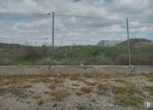 Land for sale at Calle Dehesa Vieja, Vicálvaro, Madrid, 28052 with cloud, sky, plant, fence, mesh, tree, wire fencing, composite material, road surface and landscape around