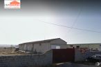 Land for sale at Zona Industrial La Colilla, La Colilla, Ávila, 05192 with car, house, sky, cloud, building, tire, electricity, automotive lighting, overhead power line and asphalt around