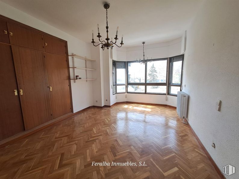 Office for rent at Calle Ferraz, Moncloa - Aravaca, Madrid, 28008 with chandelier, lighting, window, light fixture, fixture, wood, interior design, door, floor and flooring around