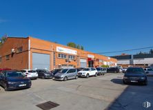 Industrial for sale at Avenida Valdelaparra, 4, Alcobendas, Madrid, 28108 with car, building, automotive parking light, wheel, land vehicle, sky, tire, vehicle, motor vehicle and automotive lighting around