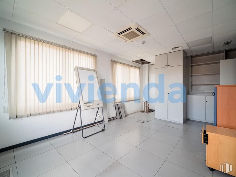 Retail for sale at Calle San Romualdo, San Blas - Canillejas, Madrid, 28037 with window, light fixture, furniture, building, fixture, automotive design, hall, flooring, ceiling and facade around