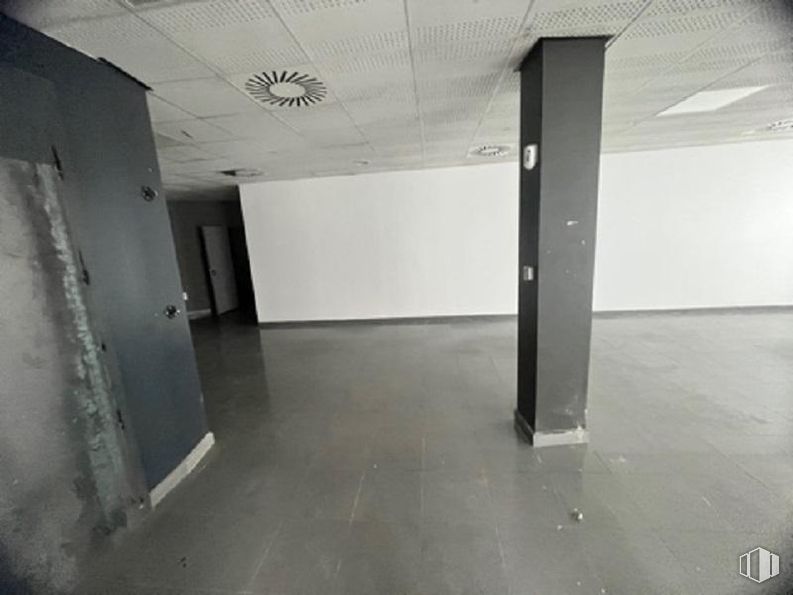 Retail for sale at Avenida Constitución, Mejorada del Campo, Madrid, 28840 with flooring, floor, hall, ceiling, parking, tints and shades, glass, concrete, monochrome photography and event around