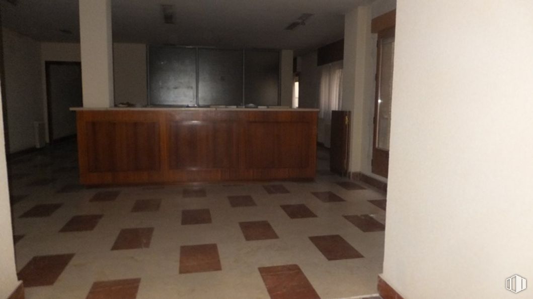 Office for rent at Zona Acueducto, Segovia, 40002 with cabinetry, wood, hall, flooring, floor, fixture, wood stain, hardwood, tile flooring and building around